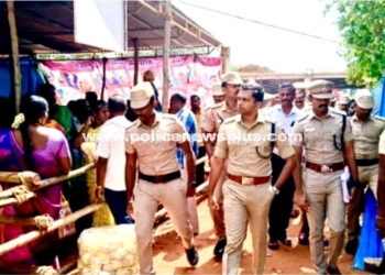 Security personnel conduct inspections ahead of the festival